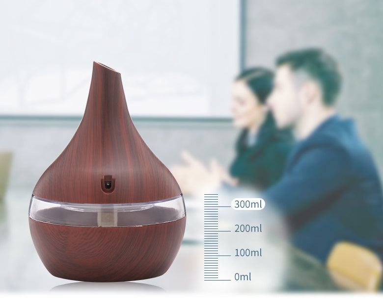 "Holzmaserung Ultraschall-Luftbefeuchter und Luftreiniger, 1L Kapazität, USB-Betrieb, Ideal für Räume bis 10 Quadratmeter"