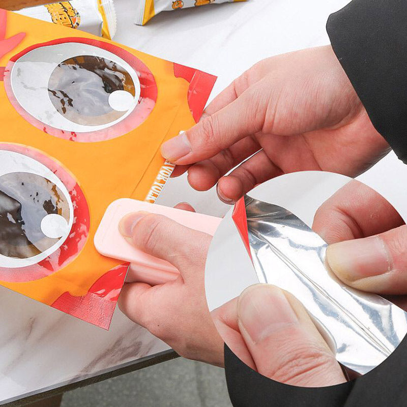 "Tragbare Mini-Versiegelungsmaschine für Snacks - Hochwertig, Sicher & Langlebig mit ABS-Körper"